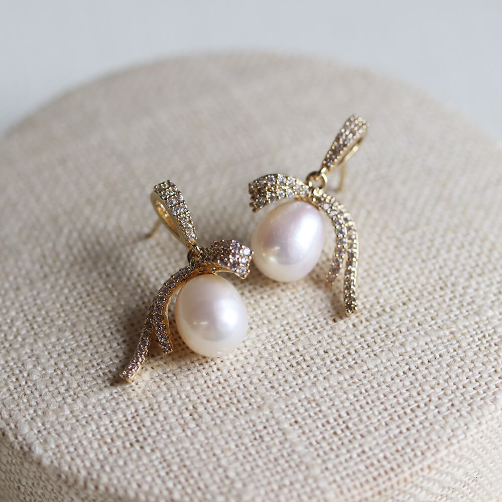 クリスタル / パール リボン ピアス